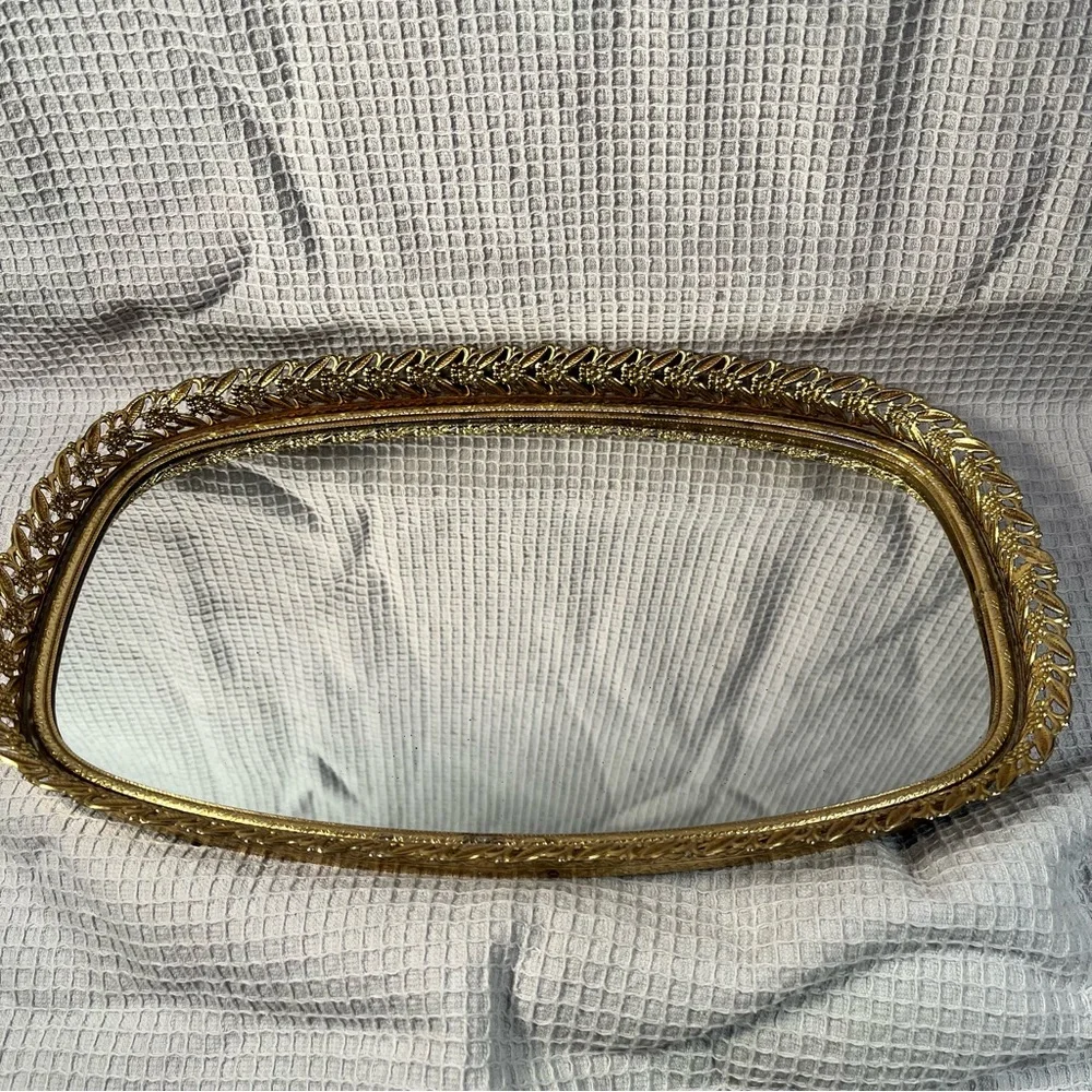 Vintage gold tone filigree vanity mirror